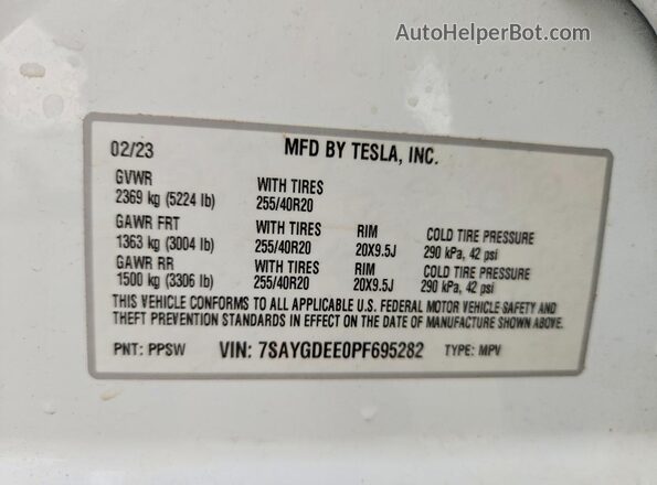 7SAYGDEE0PF695282 2023 TESLA MODEL White VIN კოდის სტიკერის ხედი