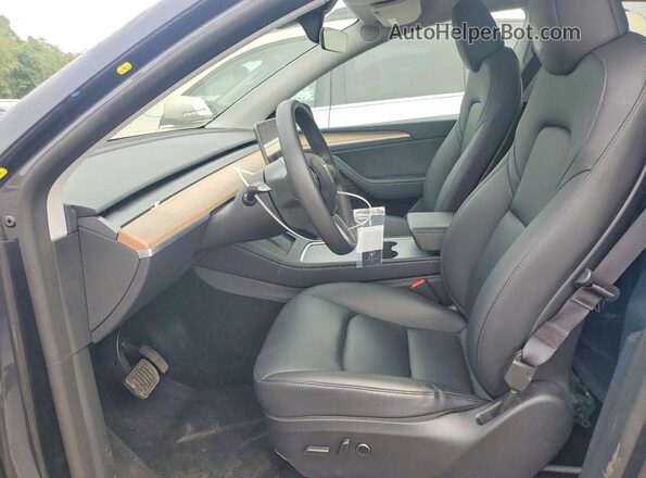 7SAYGDEE0SA352137 2025 TESLA MODEL Gray Вид салону спереду