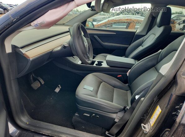 7SAYGDEE0SF217243 2025 TESLA MODEL Серый Вид салона спереди