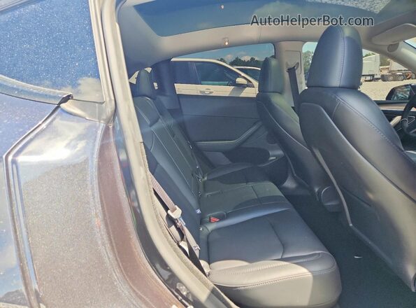 7SAYGDEE0SF298910 2025 TESLA MODEL Gray Հետևի նստատեղերի տեսք