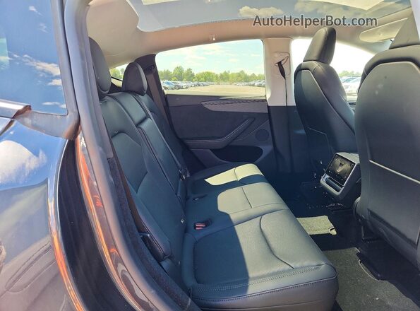 7SAYGDEE0TA486793 2026 TESLA MODEL Charcoal Vista interior trasera