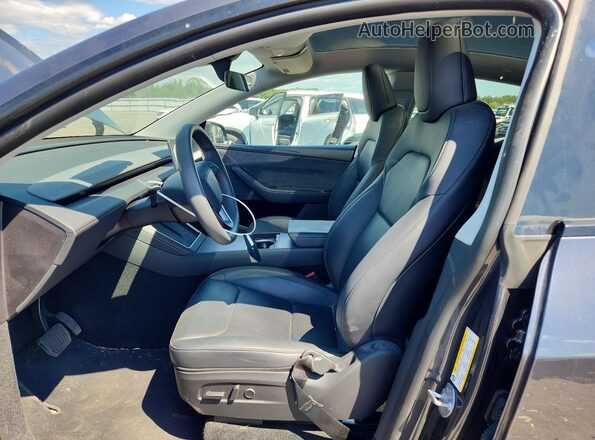7SAYGDEE0TA486793 2026 TESLA MODEL Charcoal Vista interior delantera