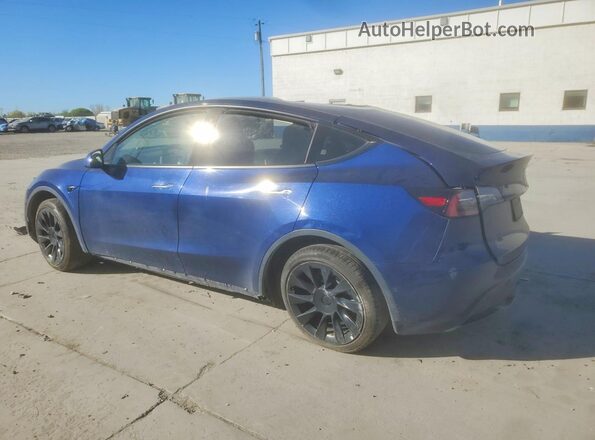 7SAYGDEE1NF387177 2022 TESLA MODEL Blue Trasero izquierdo