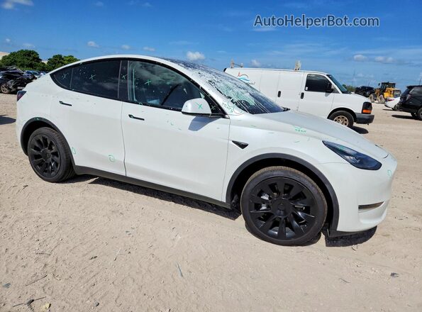 7SAYGDEE1PA129418 2023 TESLA MODEL Белый Передняя правая четверть