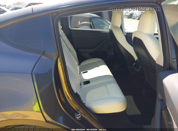 7SAYGDEE1PF608277 2023 TESLA MODEL Y Gray VIN կոդի պիտակի տեսք