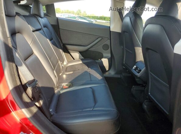 7SAYGDEE1PF702613 2023 TESLA MODEL Red Vista de los asientos traseros