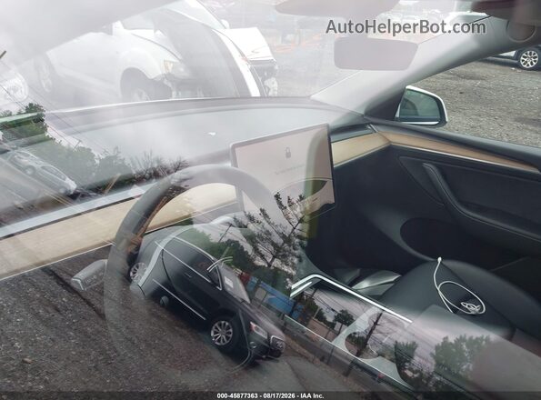 7SAYGDEE1PF771172 2023 TESLA MODEL Y White 360 interior view