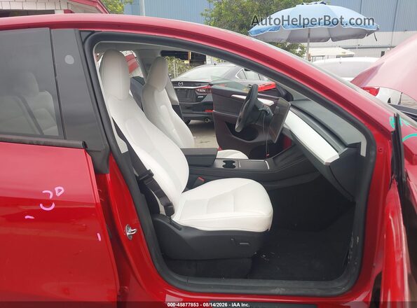 7SAYGDEE1PF917912 2023 TESLA MODEL Y Red Front interior view