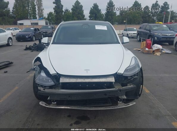 7SAYGDEE1PF962865 2023 TESLA MODEL Y White Սալոնի հետևի տեսք
