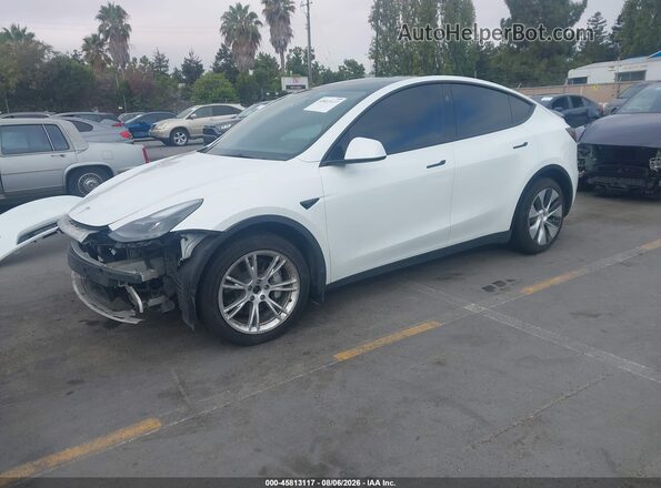 7SAYGDEE1PF962865 2023 TESLA MODEL Y White Առջևի ձախ երեք քառորդ տեսարան