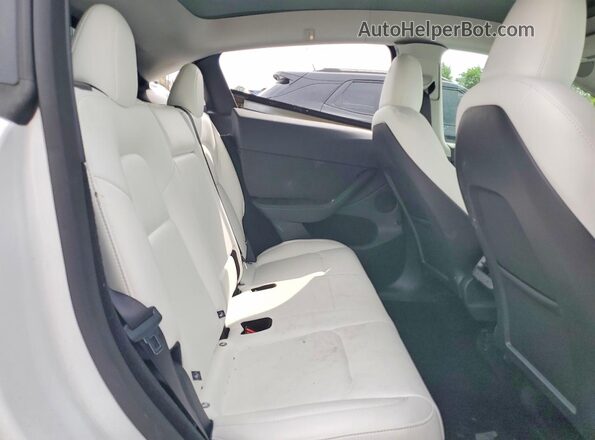 7SAYGDEE1RF209324 2024 TESLA MODEL White Հետևի նստատեղերի տեսք
