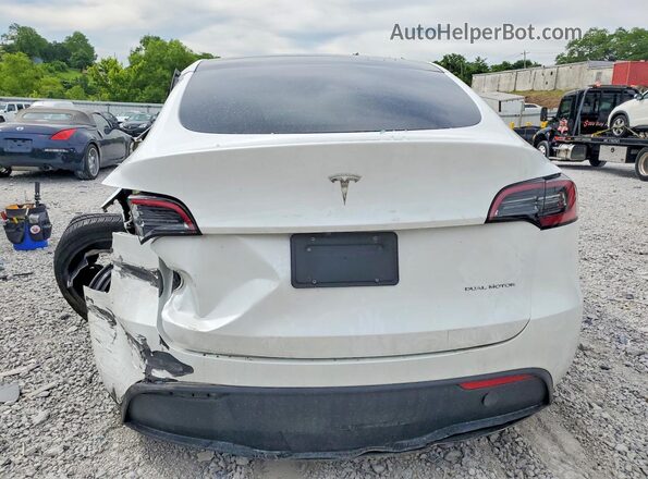 7SAYGDEE1RF209324 2024 TESLA MODEL White Հետևի տեսք