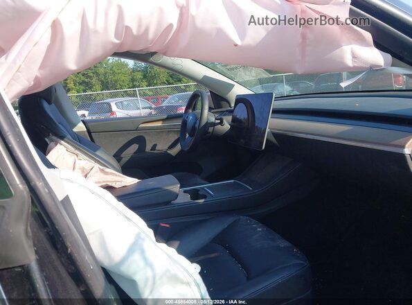 7SAYGDEE1RF986408 2024 TESLA MODEL Y Black Widok wnętrza z przodu