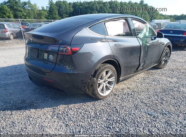 7SAYGDEE1RF986408 2024 TESLA MODEL Y Black Tył prawy