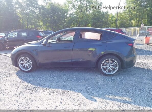 7SAYGDEE1RF986408 2024 TESLA MODEL Y Black Widok wnętrza z tyłu