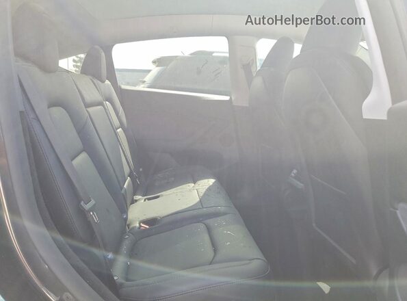 7SAYGDEE1SF281758 2025 TESLA MODEL Gray Rear interior view