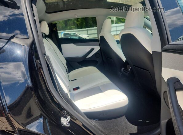 7SAYGDEE1TA629198 2026 TESLA MODEL Black Rear seats view