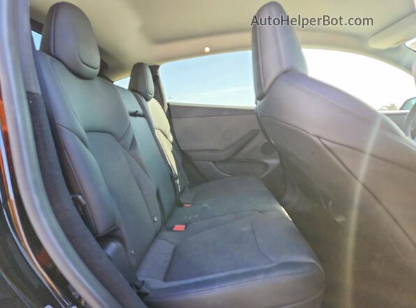 7SAYGDEE1TA649046 2026 TESLA MODEL Black Вид задніх сидінь