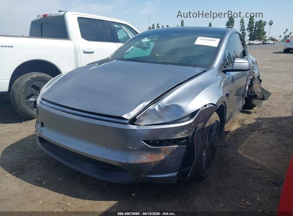7SAYGDEE1TF650538 2026 TESLA MODEL Y Gray Vista tres cuartos delantera izquierda