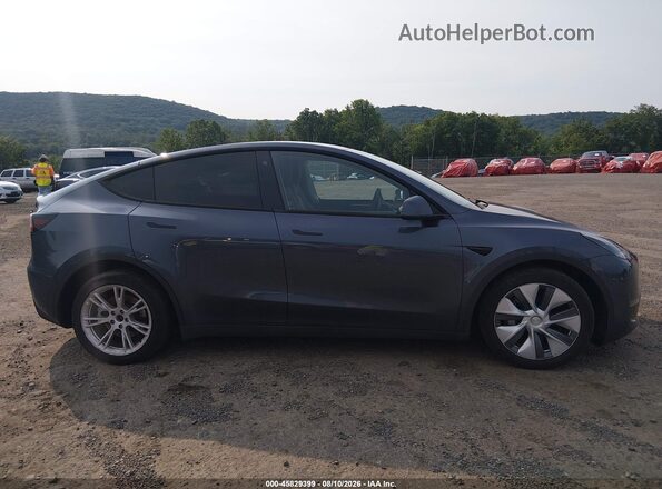7SAYGDEE2PA061162 2023 TESLA MODEL Y Gray Rear interior view