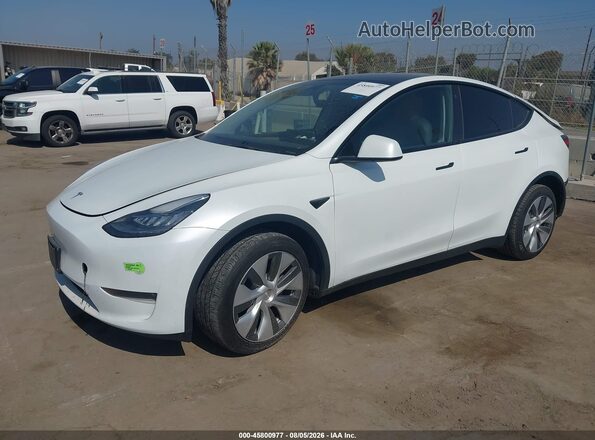 7SAYGDEE2PA109341 2023 TESLA MODEL Y White Vista tres cuartos delantera izquierda