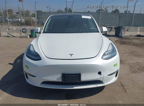 7SAYGDEE2PA109341 2023 TESLA MODEL Y White Vista interior trasera