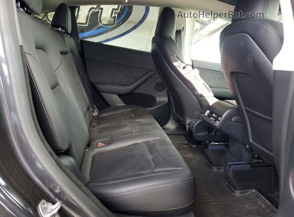 7SAYGDEE2RF014123 2024 TESLA MODEL Black Вид задніх сидінь