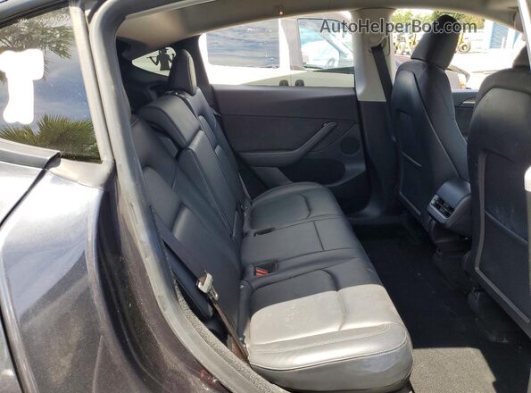 7SAYGDEE2RF032475 2024 TESLA MODEL Угольный Вид задней части салона