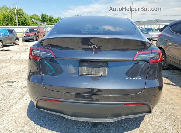 7SAYGDEE2RF130180 2024 TESLA MODEL Charcoal Rear view