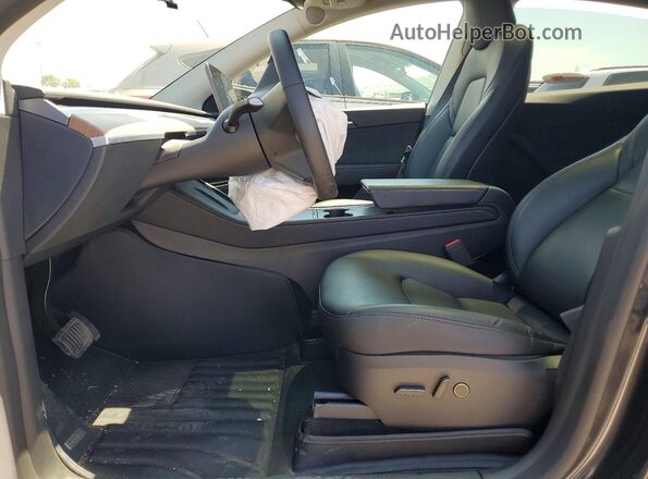7SAYGDEE2RF130180 2024 TESLA MODEL Charcoal Front interior view