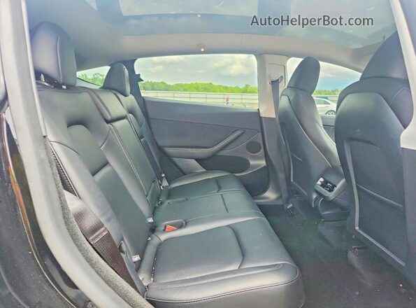 7SAYGDEE2SF301273 2025 TESLA MODEL Black Vista de los asientos traseros