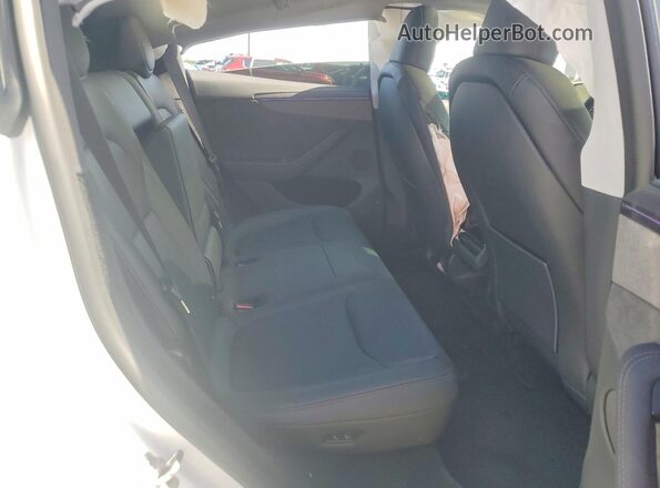 7SAYGDEE2TA465766 2026 TESLA MODEL White უკანა სავარძლების ხედი
