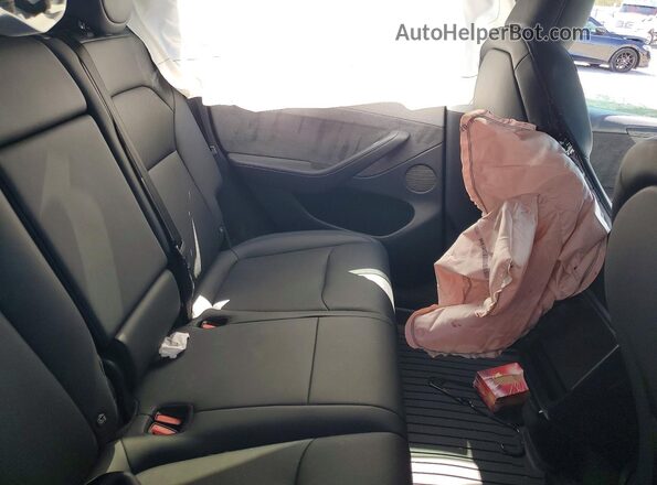 7SAYGDEE2TF391588 2026 TESLA MODEL Charcoal უკანა სალონის ხედი