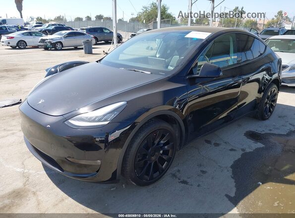 7SAYGDEE3NF359378 2022 TESLA MODEL Y Black Առջևի ձախ երեք քառորդ տեսարան