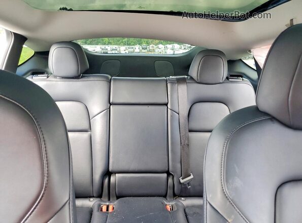 7SAYGDEE3NF481609 2022 TESLA MODEL Blue Vista de los asientos traseros