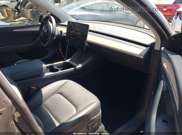 7SAYGDEE3PA137620 2023 TESLA MODEL Y Серый Вид салона спереди