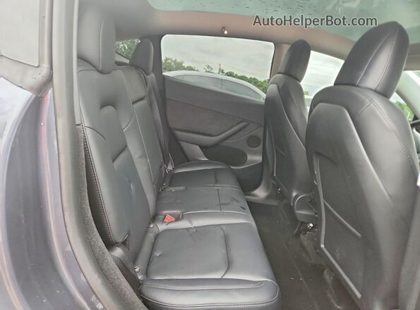 7SAYGDEE3PF614162 2023 TESLA MODEL Charcoal Սալոնի հետևի տեսք