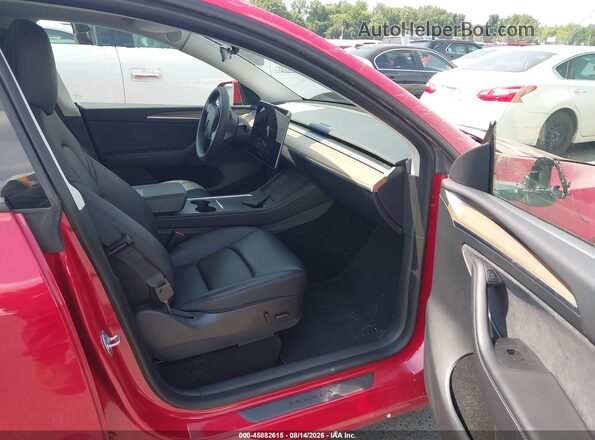 7SAYGDEE3PF703942 2023 TESLA MODEL Y Red Սալոնի դիմացի տեսք