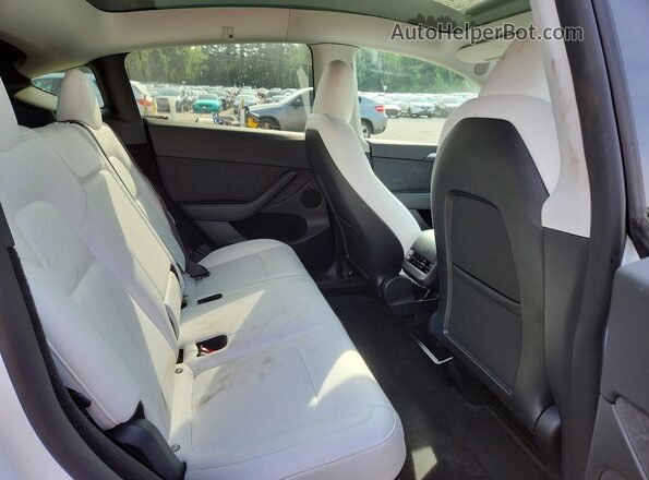 7SAYGDEE3PF797918 2023 TESLA MODEL White Widok tylnych siedzeń