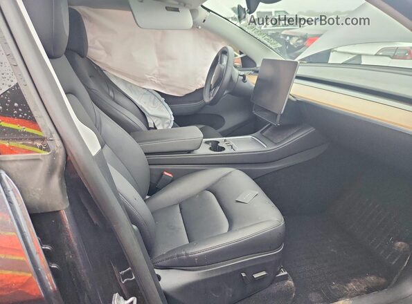 7SAYGDEE3RA249675 2024 TESLA MODEL Gray Front interior view