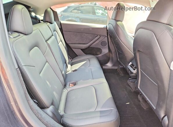 7SAYGDEE3RA249675 2024 TESLA MODEL Gray Rear seats view