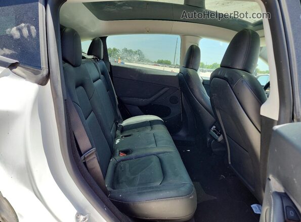 7SAYGDEE3RA306666 2024 TESLA MODEL White უკანა სავარძლების ხედი