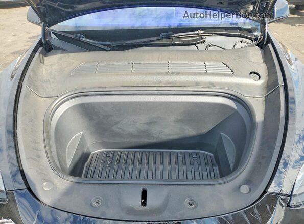 7SAYGDEE3RF060964 2024 TESLA MODEL Black Սալոնի հետևի տեսք