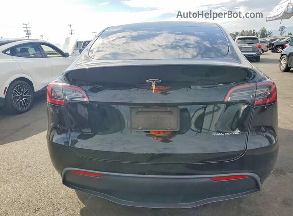 7SAYGDEE3RF060964 2024 TESLA MODEL Black Հետևի տեսք