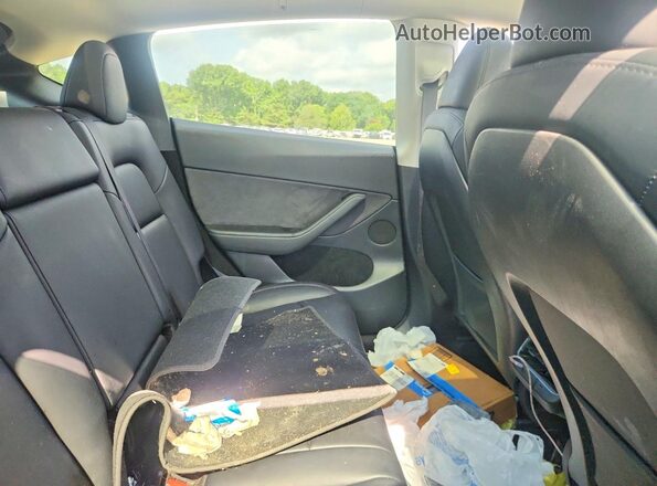 7SAYGDEE3RF993411 2024 TESLA MODEL Черный Вид задних сидений