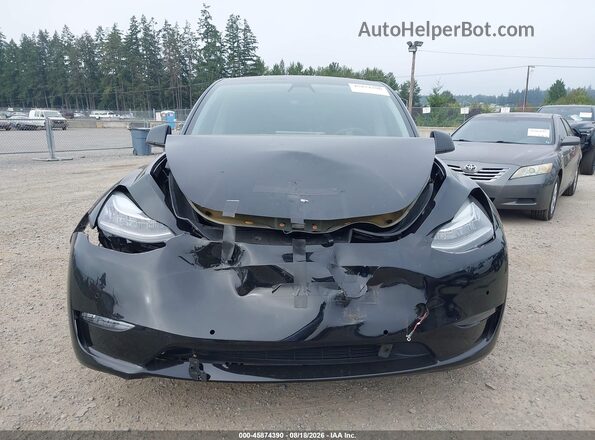 7SAYGDEE4NF368347 2022 TESLA MODEL Y Black Rear interior view