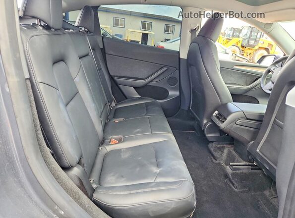 7SAYGDEE4PA077685 2023 TESLA MODEL Charcoal Սալոնի հետևի տեսք