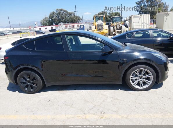 7SAYGDEE4PA079159 2023 TESLA MODEL Y Black Widok wnętrza z tyłu