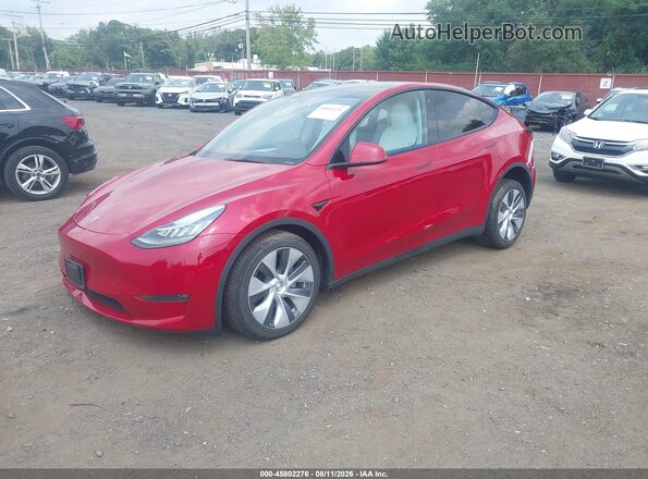 7SAYGDEE4PA116565 2023 TESLA MODEL Y Red Առջևի ձախ երեք քառորդ տեսարան