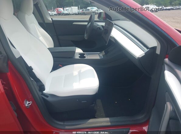 7SAYGDEE4PA116565 2023 TESLA MODEL Y Red Սալոնի դիմացի տեսք